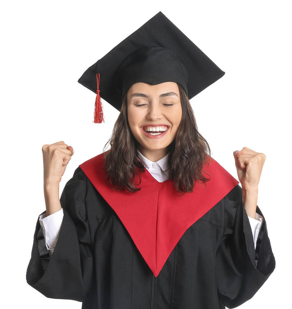 Happy female graduating student on white background - Photo, image