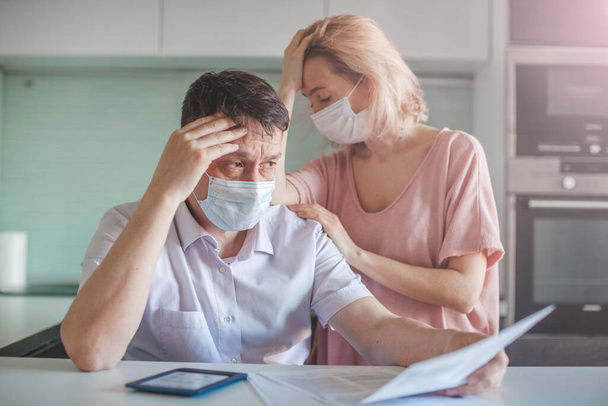 Couple worried about money problem during the pandemic coronavirus - Photo, Image