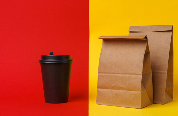 Coffee cups and takeaway food package. Takeout meal - Φωτογραφία, εικόνα