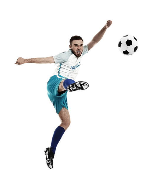 Young man playing football on white background - Фото, изображение