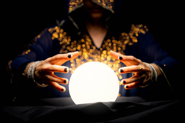 Fortune teller's hands with crystal ball - Fotografie, Obrázek
