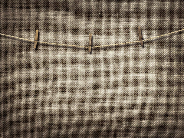 szárítókötél és clothespins vászon alapon - Fotó, kép