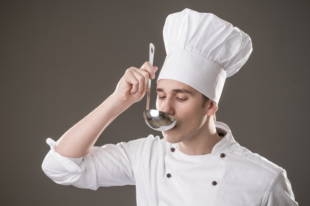 chef com uma colher
 - Foto, Imagem