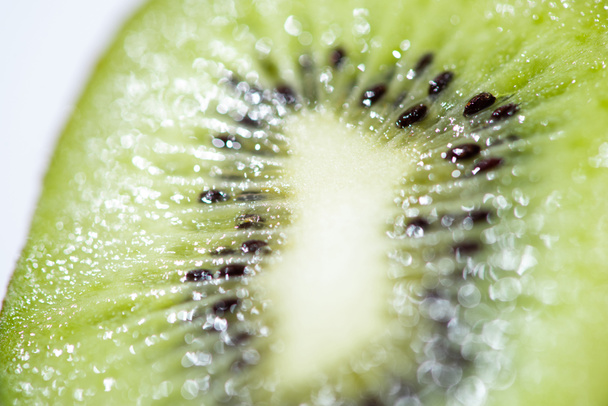 close up of ripe and fresh kiwifruit half  - Фото, изображение