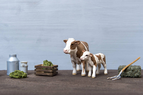 Group of realistic figures of farm standing on brown floor. Agriculture concept. - Foto, Imagen