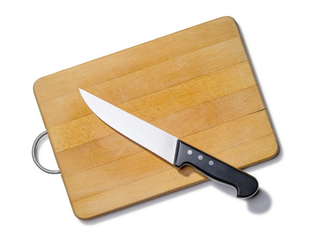 Tagliere in legno con coltello da cucina
 - Foto, immagini