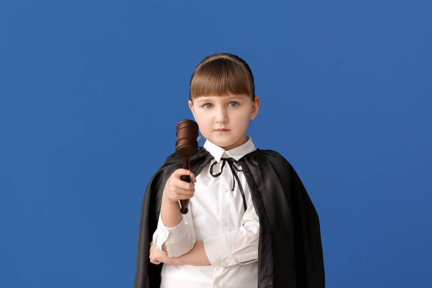 Portrait of little judge on color background - Photo, Image