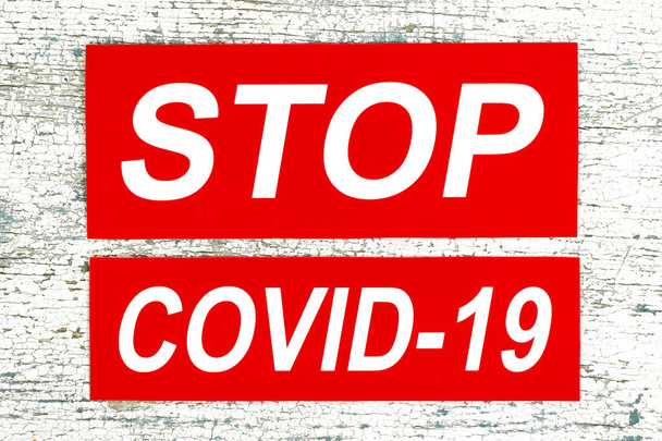 Stop virus Covid-19 concept, on wooden background close-up - Foto, imagen