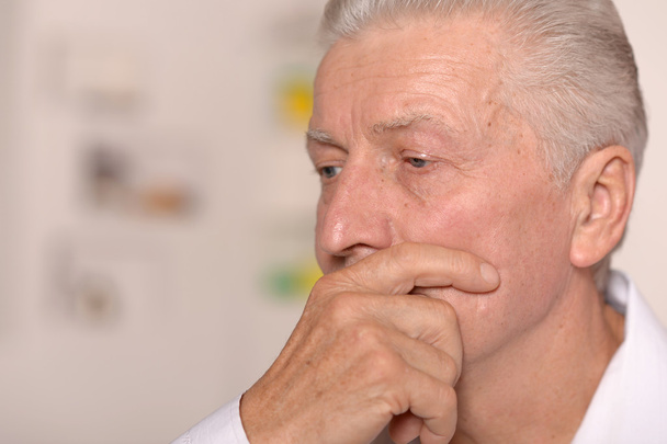 Senior man thinking about something - Photo, Image