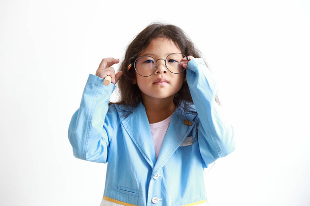 Asian kid girl wear glasses wearing a suit uniforms isolated on white background. - Valokuva, kuva
