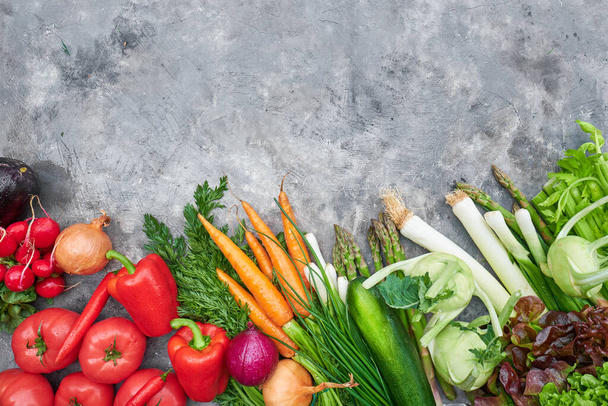 Fresh, raw vegetables on a rustic background. healthy eating concept. Vitamins, immunity - Фото, изображение