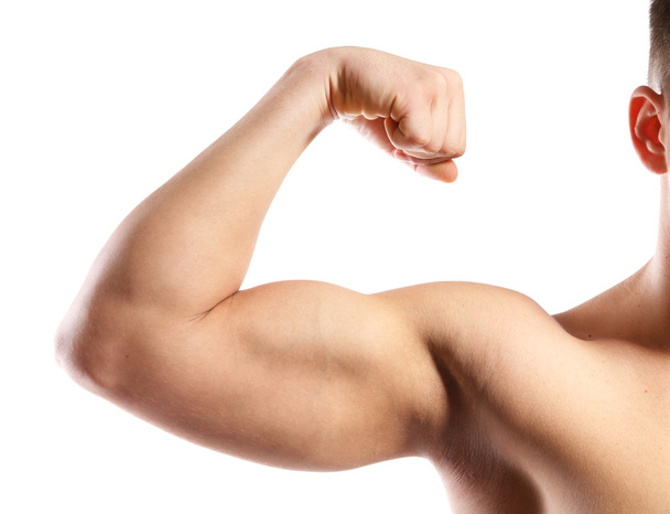 Young muscular man hand with biceps, isolated on white - Fotó, kép