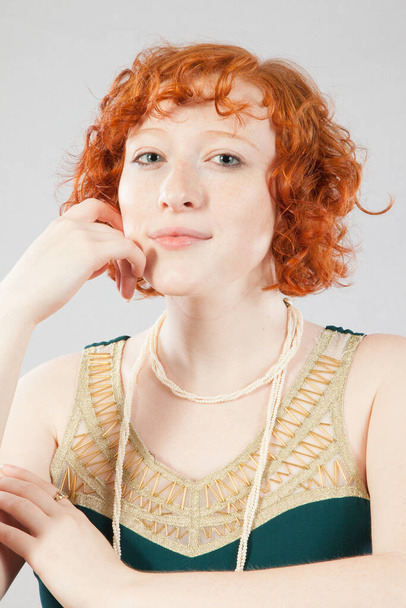 Pretty Redhead looking thoughtful - Valokuva, kuva