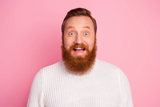 Close-up portrait of his he nice attractive crazy funny funky childish cheerful cheery foxy man having fun good news reaction isolated over pink pastel color background - Foto, Bild