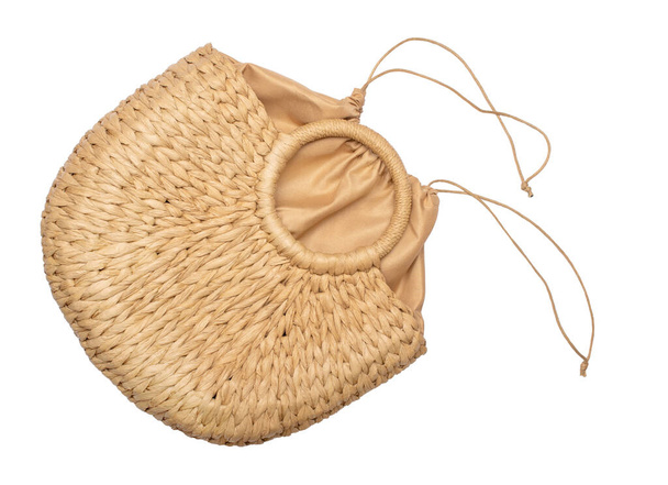 wicker straw basket bag isolated on white background. Beach summer or vintage autumn bag - Photo, Image