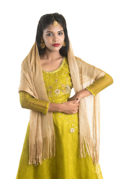 Portrait of beautiful traditional Indian girl posing on white background. - Zdjęcie, obraz
