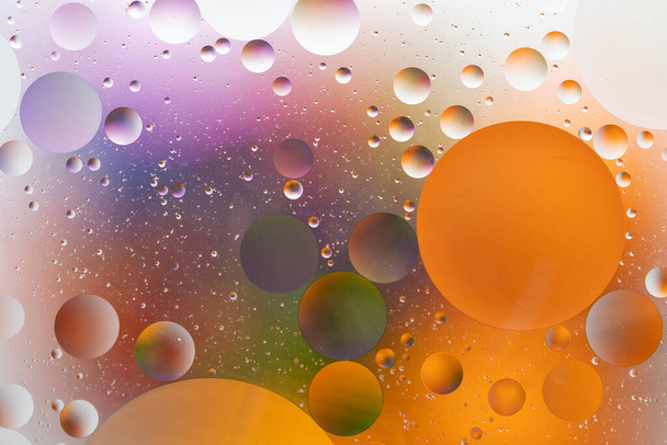 Abstract colorful backdrop with oil drops on water surface. Abstract background. - Foto, immagini