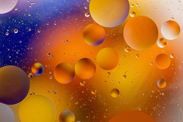 Colorful backdrop with oil drops on water surface. Abstract background. - Φωτογραφία, εικόνα