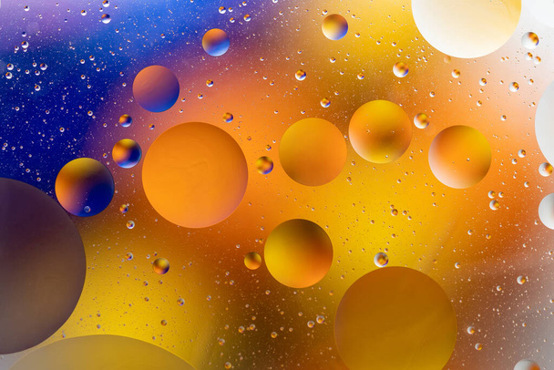 Colorful backdrop with oil drops on water surface. Abstract background. - Фото, зображення
