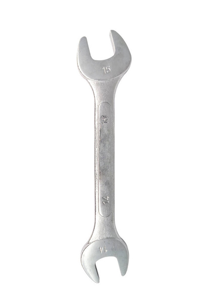 Single spanner size 14 and 15 isolated on white background. Chrome wrench in vertical. Open-ended wrench in close-up - Photo, Image