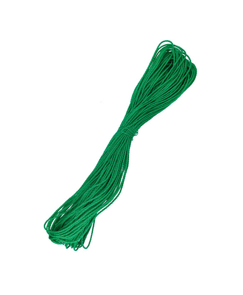 New green nylon utility rope isolated on white background without shadow. A coil of green rope in close-up - Photo, Image
