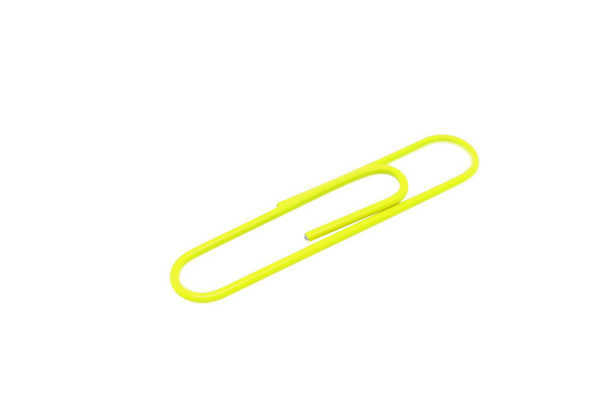 Single yellow paper clip on a white background. One paper clip image - Photo, Image