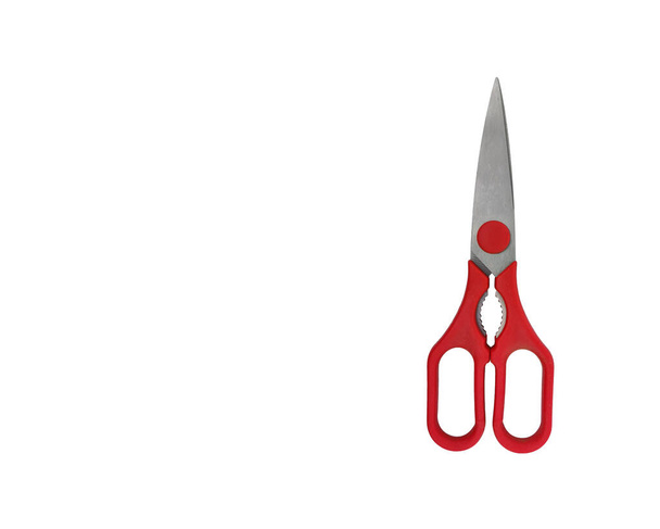 A red shears isolated on white background without shadow with copy space. Multifunction Kitchen Scissors (can open soft drink bottle, crack walnut nuts, scrap fish, cut iron wire, cut meat) - Photo, Image