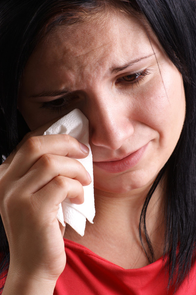 Una joven está triste y llorando
 - Foto, imagen