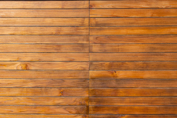 Fondo pavimento in legno. Pavimenti in legno all'aperto materiale, tavole di colore naturale con vernice, vista dall'alto
. - Foto, immagini