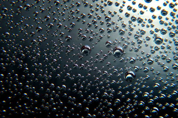 Fundo abstrato preto com bolhas de ar. Textura de bolhas em preto
. - Foto, Imagem