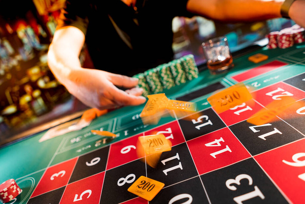 Man playing roulette at the casino - Shallow depth of field - Фото, зображення