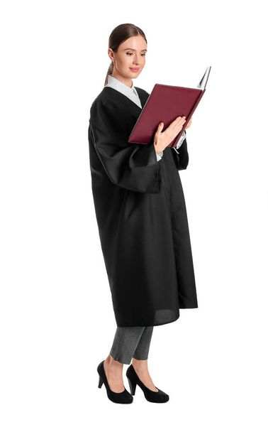 Female judge with book on white background - Foto, Bild