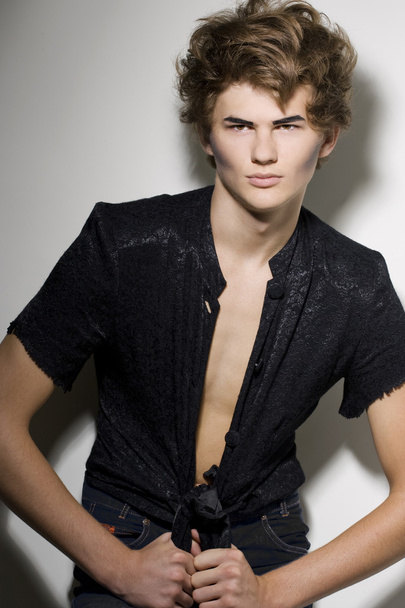 Male fashion model with stylish makeup - Foto, afbeelding