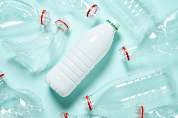 Many used plastic beverage bottles. - Фото, изображение