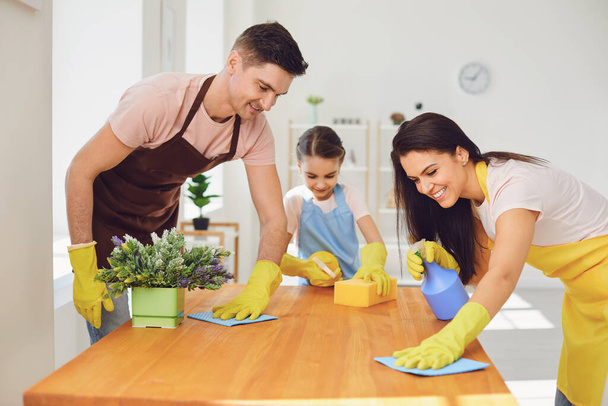 Happy family cleans the room in the house. - Photo, Image