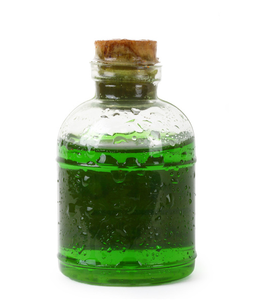 Bottle of green liquid - Foto, afbeelding