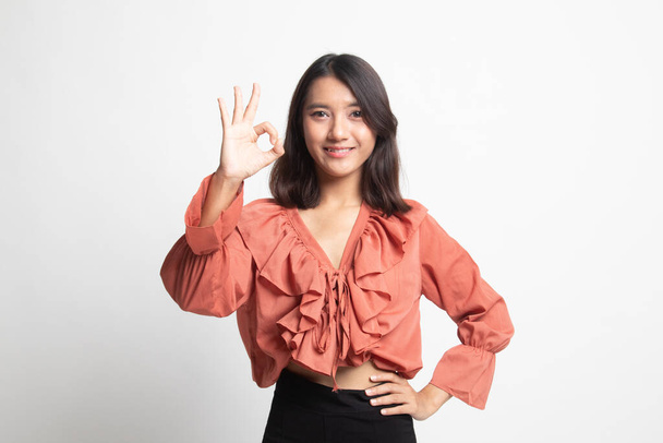 Young Asian woman show OK sign on white background - Φωτογραφία, εικόνα