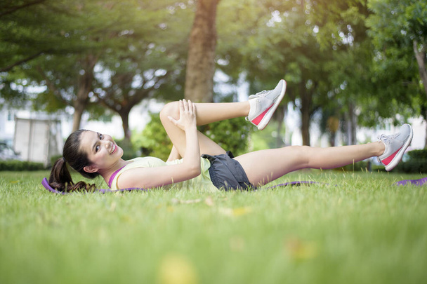 Woman is workout in outdoor  - Valokuva, kuva