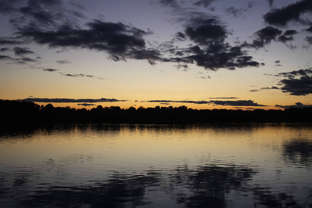beautiful sunset over the lake - Фото, изображение