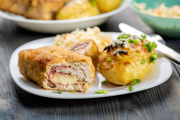 cutlet cordon bleu and hasselback potatoes - a simple and tasty dish - 写真・画像