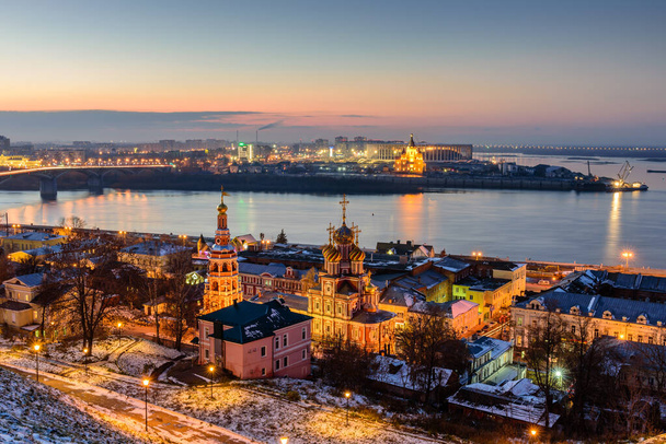 Nizhny Novgorod, Russia - November 4, 2017: Beautiful panoramic view of the evening city near Kremlin with the Stroganov Church and Oka river. - Foto, immagini