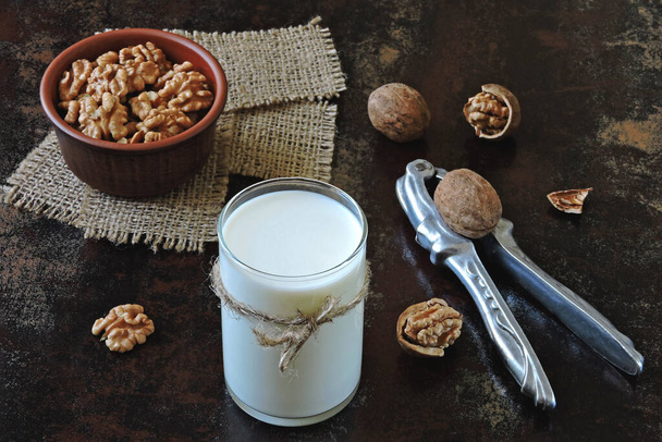 Walnut milk. Walnuts and milk. Keto drinks. Keto diet. Vegan milk. Eco food. Superfoods - Photo, Image