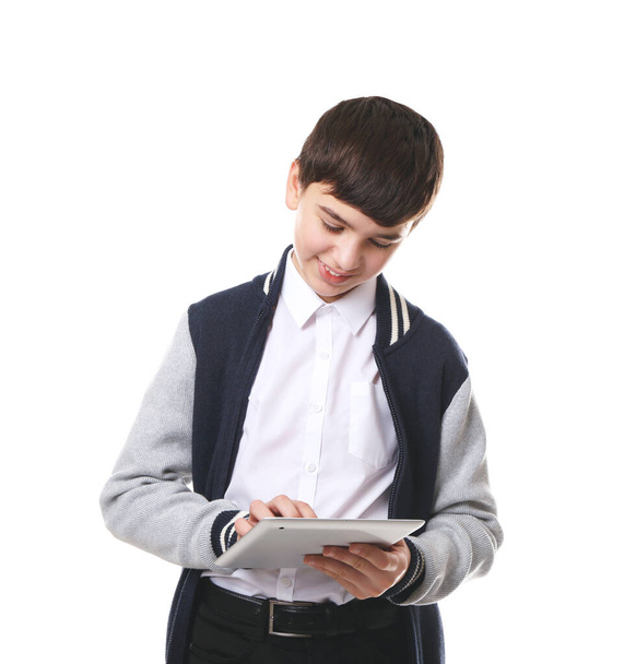 Cute boy in school uniform on white background - Zdjęcie, obraz