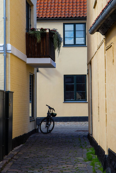 old yellow houses of old town Dragor, Denmark - 写真・画像