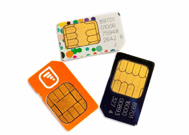 Három különböző SIM kártya izolált fehér háttér. - Fotó, kép