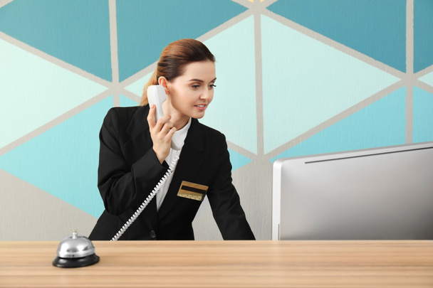 Female receptionist working in hotel - Photo, Image