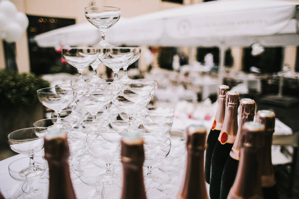 photo of champagne glasses pyramid on a table - Foto, Bild