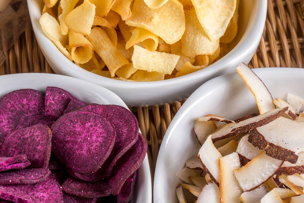 Cassava chips, coconut chips and - Photo, Image
