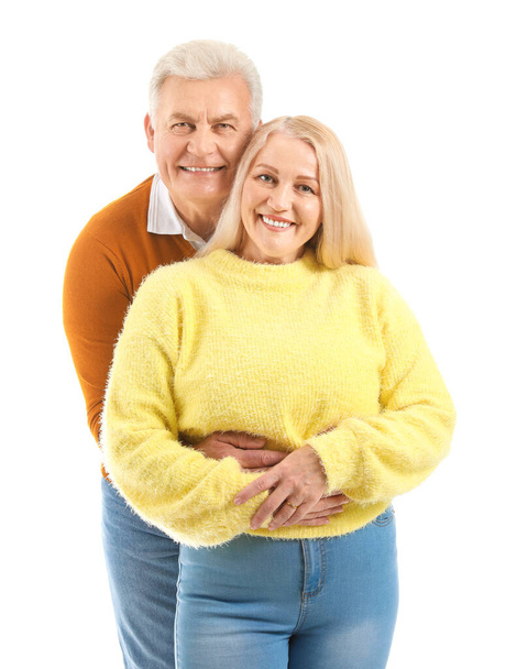 Portrait of happy elderly couple on white background - Photo, Image
