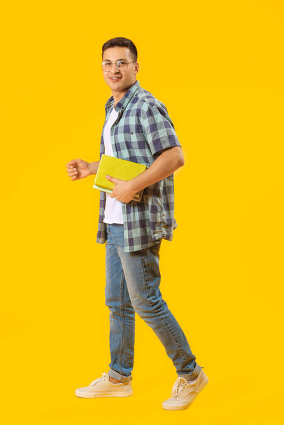 Portrait of male student on color background - Fotoğraf, Görsel